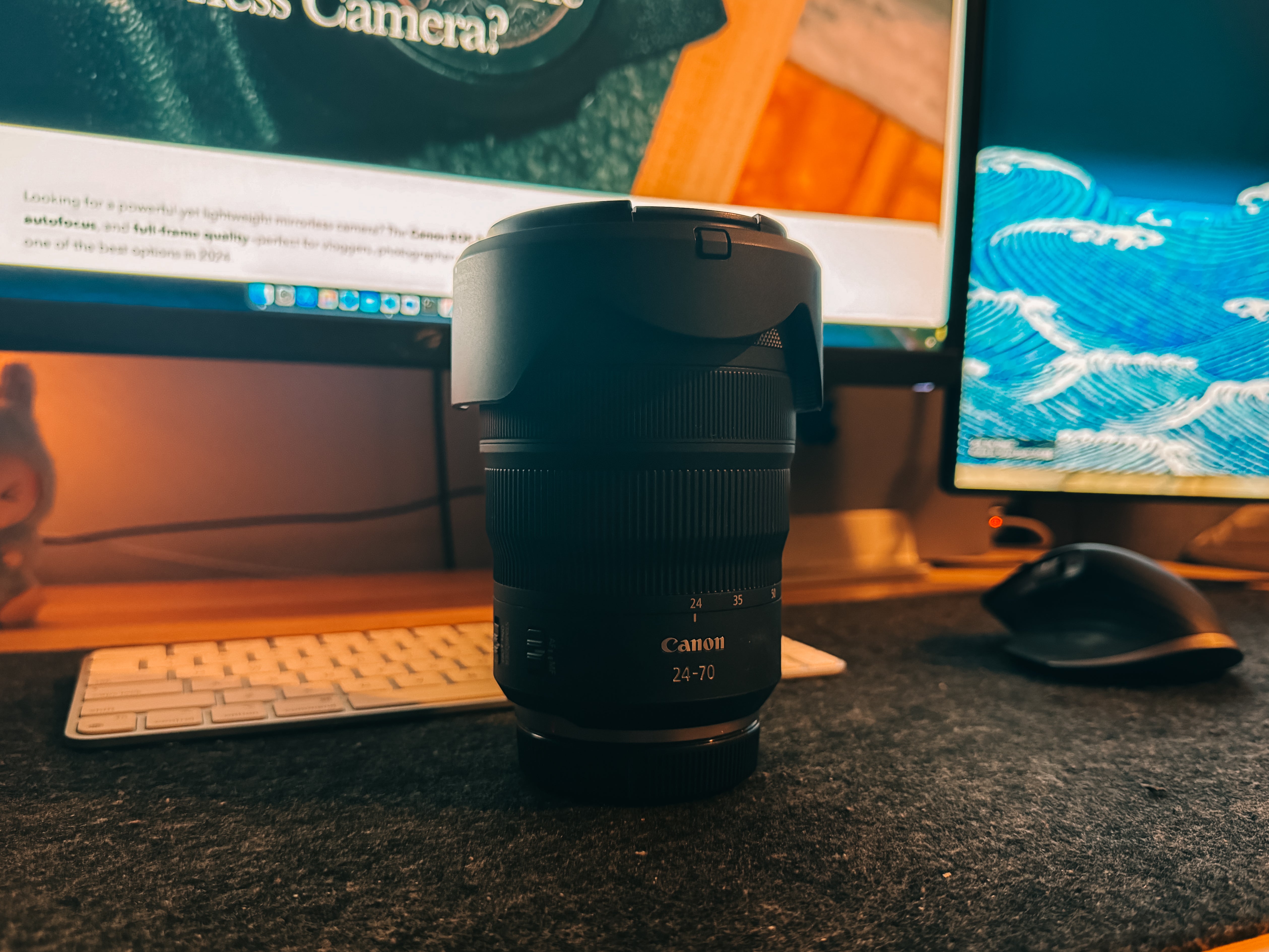 Canon RF 24-70mm f/2.8L IS USM lens with red ring design, perfect for professional photography and videography.