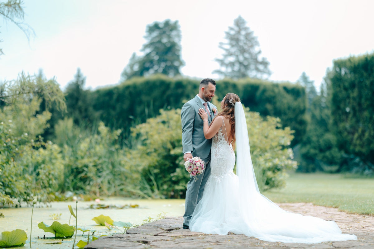Douglas and Gemma by the lily pond at the Niagara Parks Botanical Gardens, photographed by KG Marfil